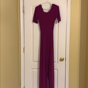 purple jumpsuit with open back